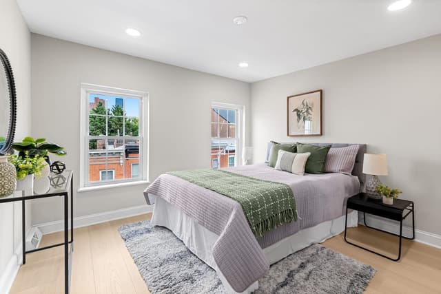 Second bedroom with two windows and recessed lighting